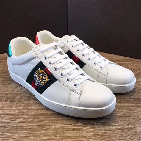 gucci schoenen heren laag|gucci embroidered sneakers.